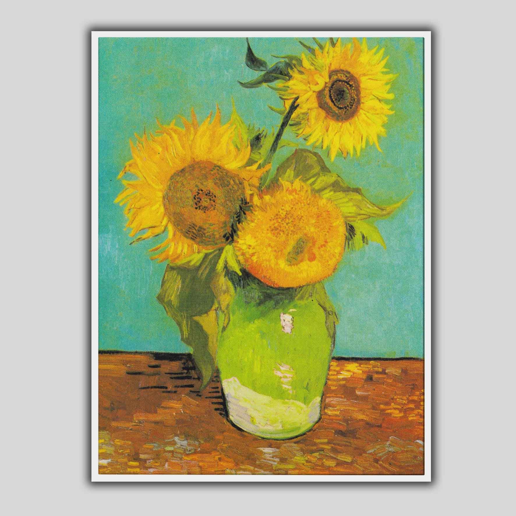 Vaso con tre girasoli