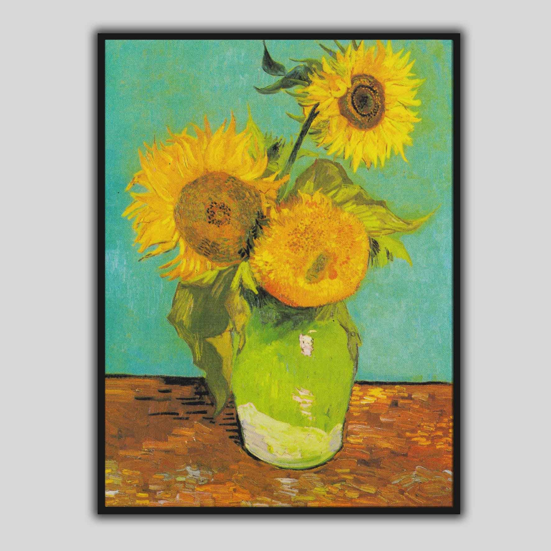 Vaso con tre girasoli