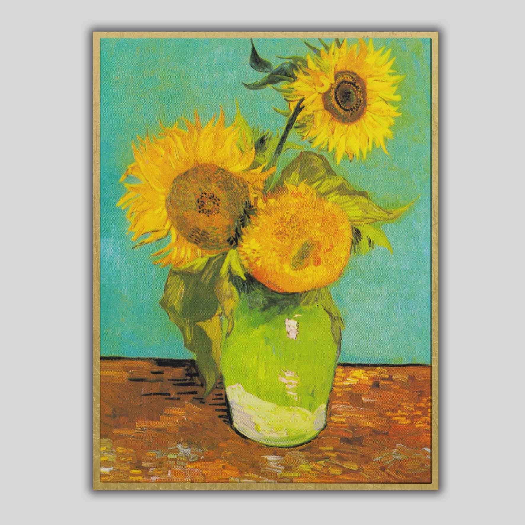 Vaso con tre girasoli